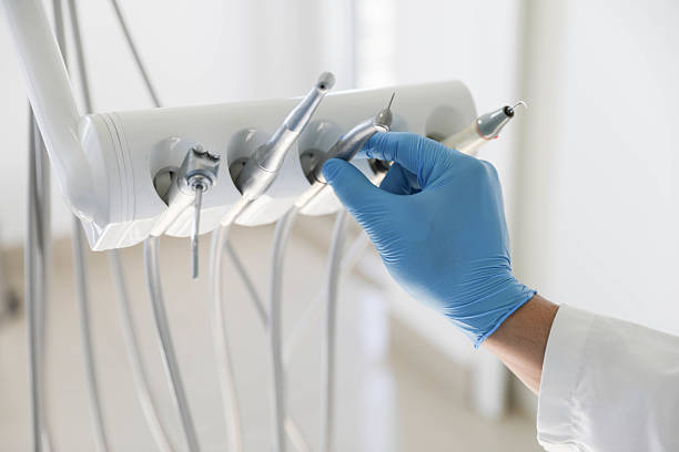 Professional Tooth Extraction technician working in Helena, OK
